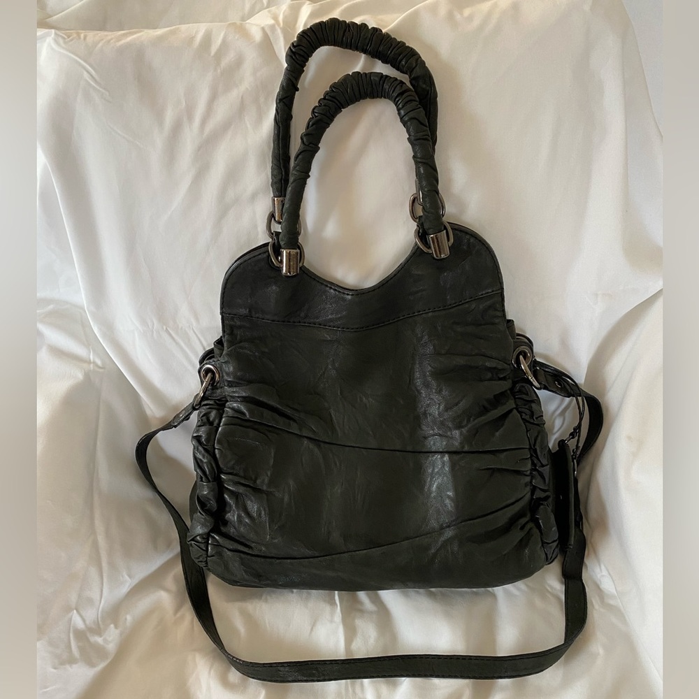 Black slouchy RAFE handbag with crossbody strap.